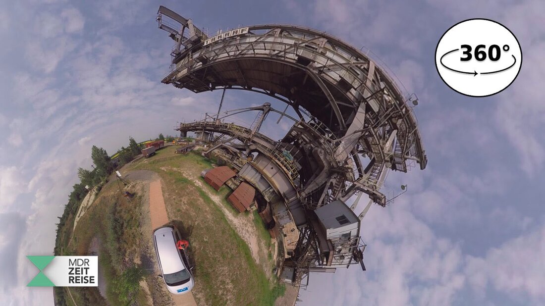 Bis 1996 wurde im Leipziger Süden Braunkohle abgebaut. Heute erinnert ein Technologiepark an den Steinkohlenbergbau. Im 360-Grad-Video könnt ihr exklusiv auf den Bagger steigen. Alle 360 VR-Videos der MDR ZEITREISE in einer APP. Außerdem viele weitere Videos aus Mitteldeutschland damals und heute, darunter zahlreiche Vorher-Nachher-Bilder. Zum Download der APP: http://www.mdr.de/zeitreise/app Mehr Geschichte unter http://www.mdr.de/zeitreise. Youtube-Link